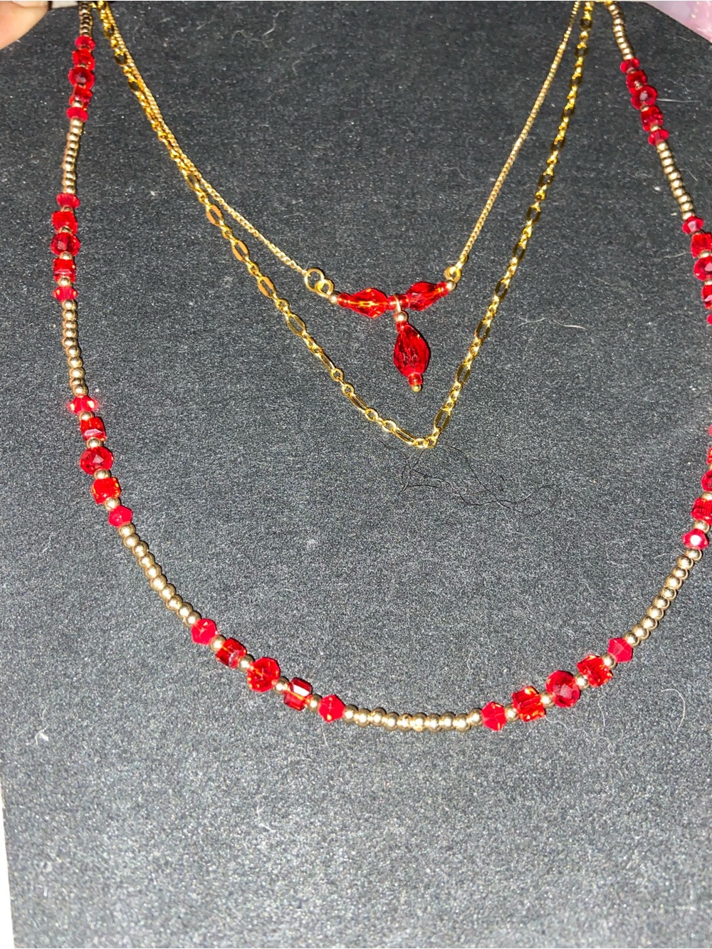 Gold Tone Layered Necklace with Red Crystal Beads